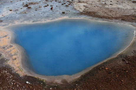 Blesi is one of the non-erupting hot spring near Geysir and Strokkur. Blesi has two pools, one of which is this striking blue color, thanks to the minerals in the water.