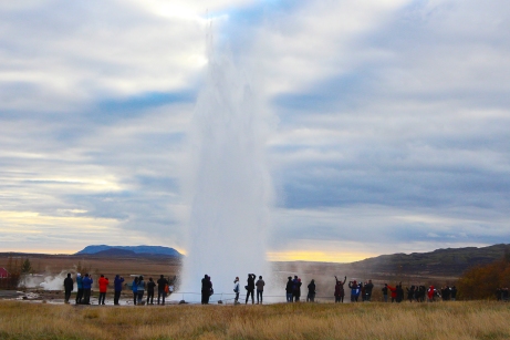 Tourists from all over the world gather to watch Strokkur erupt.